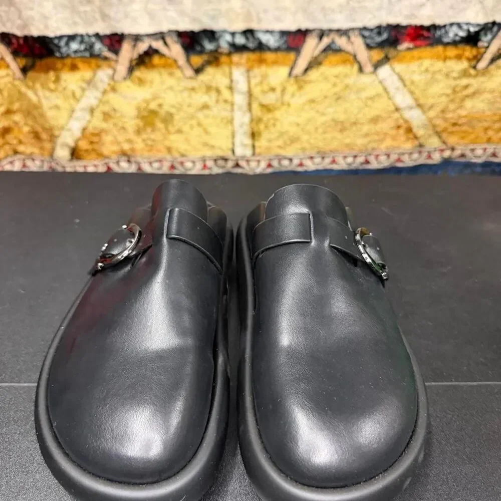 Source Unknown black leather